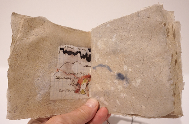 "Map of Where I've Been", handmade paper of lomandra, abaca, and purged notebook pages; ink and watercolor on notebook fragments, thread, $400